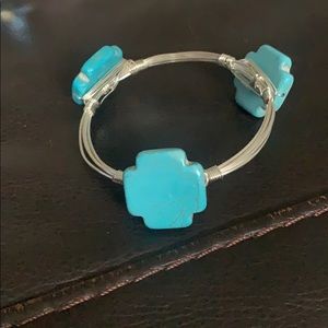 Silver bracelet with turquoise cross stones
